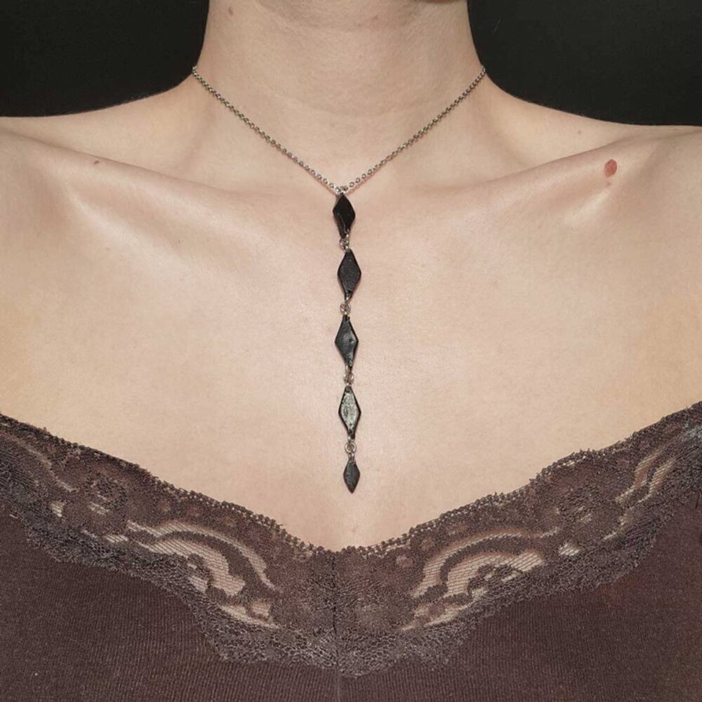 Gothic black diamond-shaped rosary necklace with a small silver chain